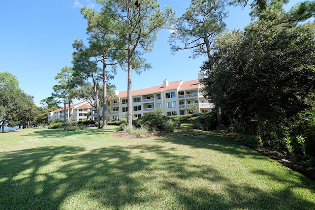 view of community with a lawn