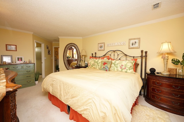 carpeted bedroom featuring ornamental molding and a textured ceiling