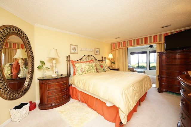 carpeted bedroom featuring a textured ceiling and ornamental molding