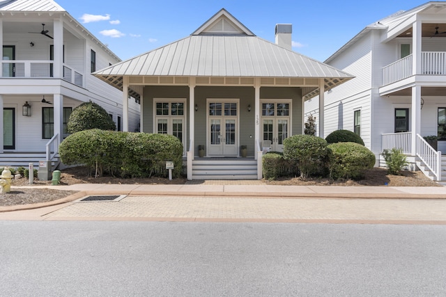 view of front of home with a balcony