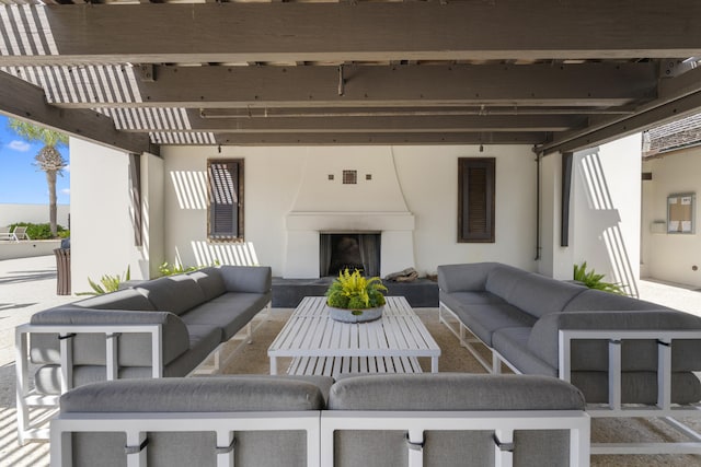 view of patio / terrace featuring an outdoor living space with a fireplace and a pergola