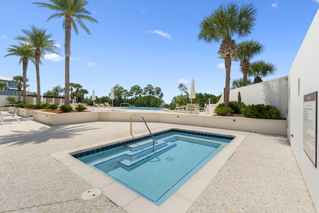 view of pool featuring a patio