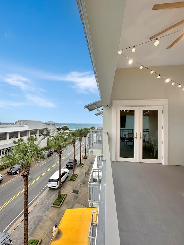 balcony featuring a water view