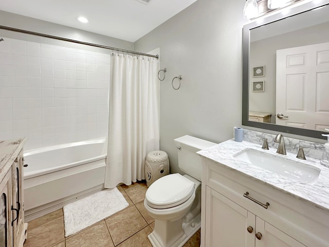 full bathroom featuring vanity, tile patterned floors, toilet, and shower / bathtub combination with curtain