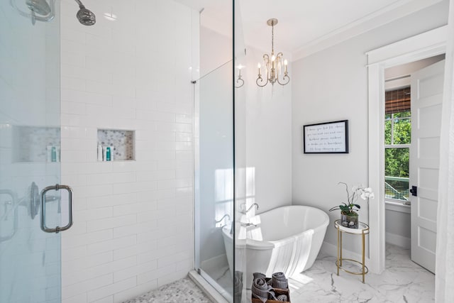 bathroom featuring plus walk in shower, an inviting chandelier, and crown molding