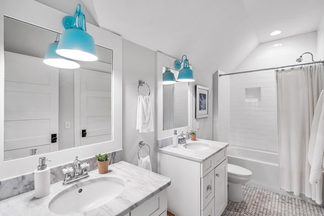 full bathroom featuring shower / bath combination with curtain, toilet, vanity, and vaulted ceiling