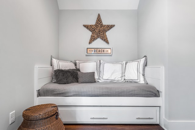 bedroom featuring dark wood-type flooring