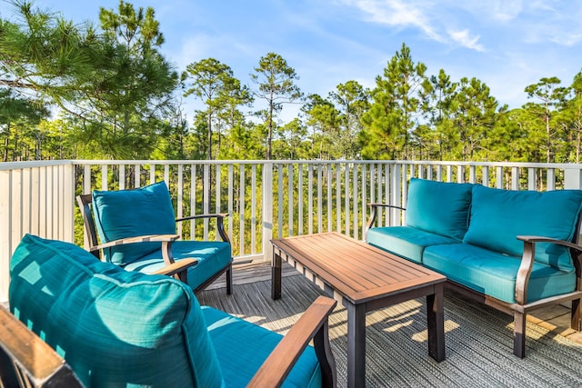 wooden deck featuring an outdoor living space