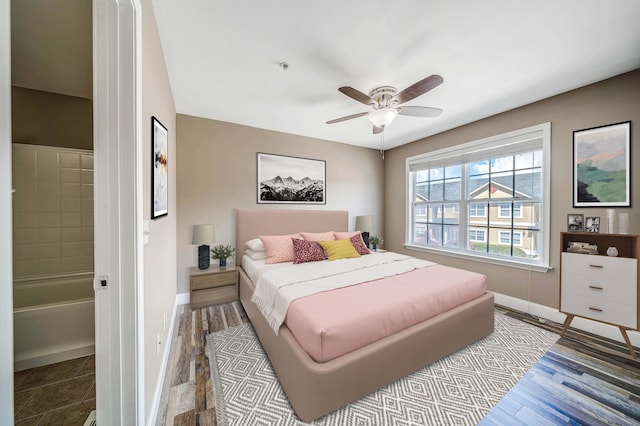 bedroom with baseboards and ceiling fan
