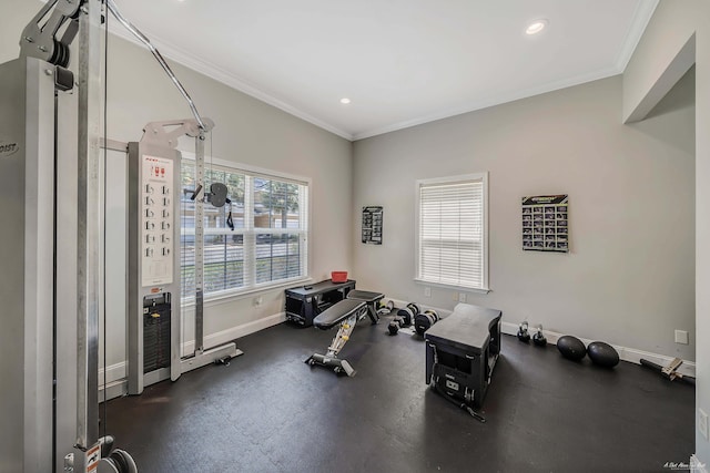 workout area featuring baseboards, recessed lighting, and ornamental molding