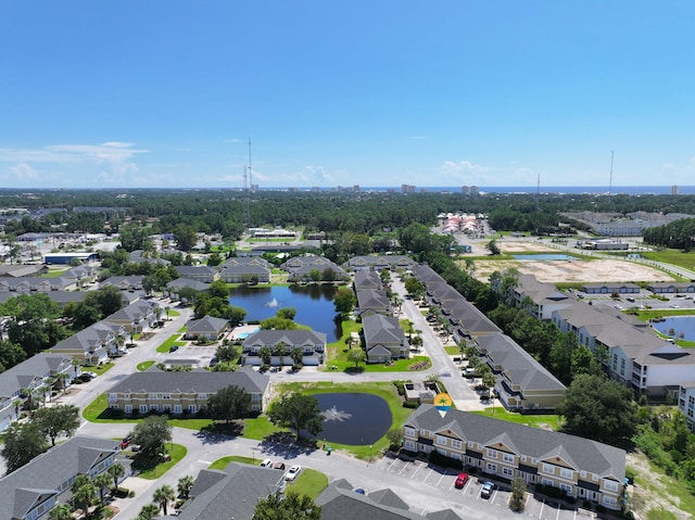 bird's eye view with a residential view and a water view