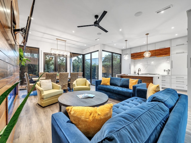 220 N Saint Francis Dr, Miramar Beach, FL 32550 - living room with light wood-style flooring, ceiling fan, and recessed lighting