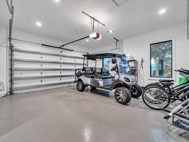 220 N Saint Francis Dr, Miramar Beach, FL 32550 - garage featuring a garage door opener and recessed lighting