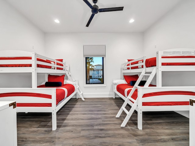 bedroom featuring ceiling fan and dark wood-type flooring