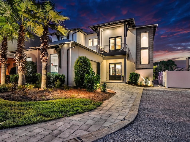 view of front of property with a balcony