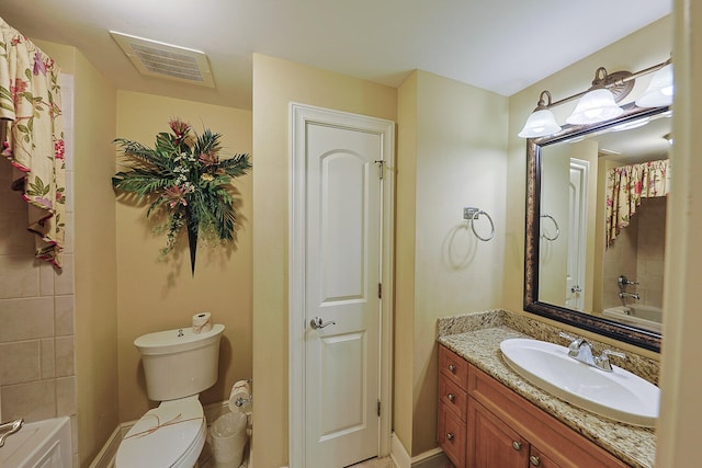 full bathroom featuring vanity, toilet, and shower / bath combo