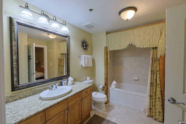 full bathroom featuring vanity, toilet, tile patterned floors, and shower / bath combo