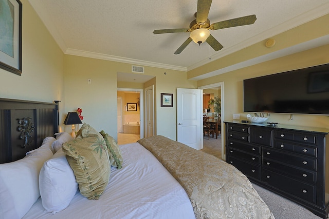 carpeted bedroom with ensuite bathroom, crown molding, a textured ceiling, and ceiling fan