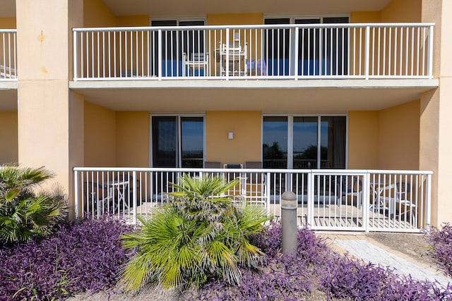 doorway to property featuring a balcony