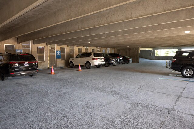 garage featuring a carport