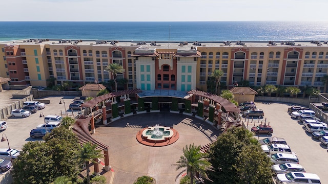 view of building exterior with a water view