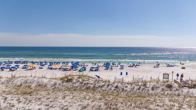 property view of water featuring a beach view