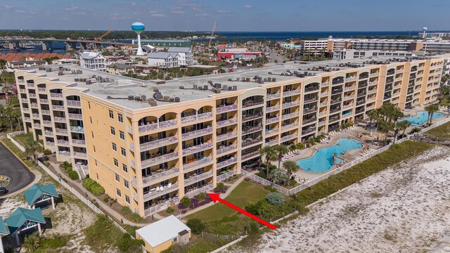 1150 Santa Rosa Blvd Unit 117, Fort Walton Beach, FL 32548 - aerial view of apartment complex, a pool, and a notable bridge