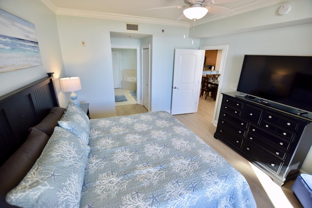 1150 Santa Rosa Blvd Unit 117, Fort Walton Beach, FL 32548 - bedroom featuring light wood finished floors, ornamental molding, ensuite bath, and a ceiling fan