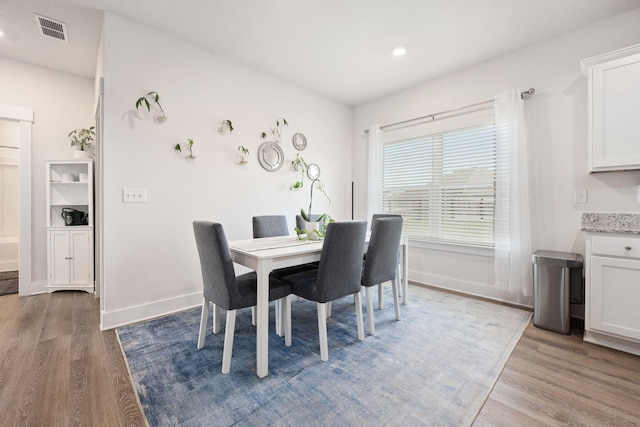 dining area featuring light hardwood / wood-style flooring