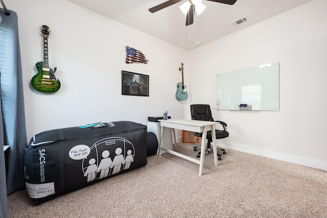 bedroom featuring ceiling fan and carpet