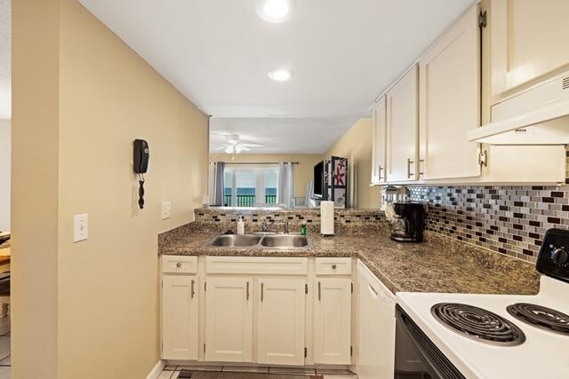 kitchen featuring ceiling fan, sink, white appliances, backsplash, and extractor fan