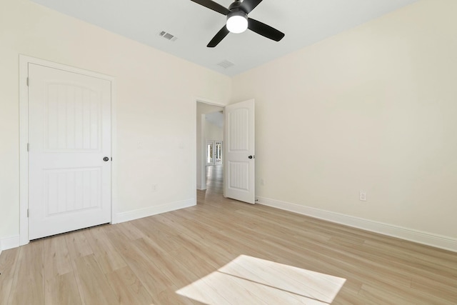 unfurnished bedroom featuring ceiling fan and light wood-type flooring