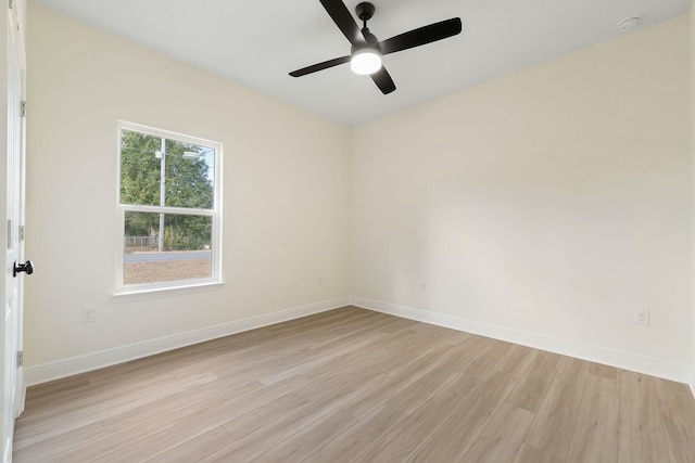 spare room featuring ceiling fan and light hardwood / wood-style floors