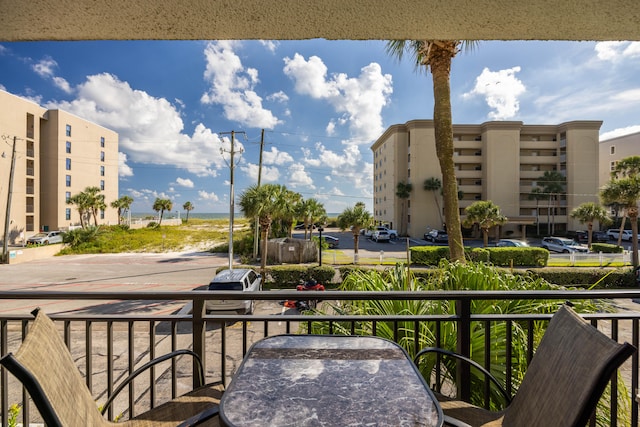balcony featuring outdoor dining space