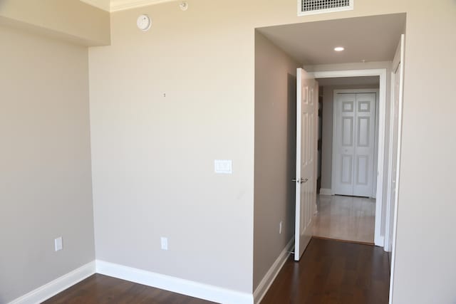 hall featuring dark hardwood / wood-style floors