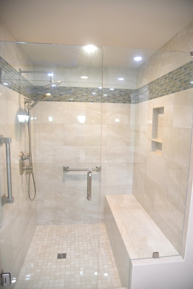 bathroom with an enclosed shower