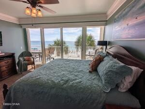 bedroom featuring ceiling fan, access to outside, and crown molding