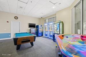 6415 Thomas Dr Unit 205, Panama City Beach, FL 32408 - recreation room with plenty of natural light, pool table, and carpet