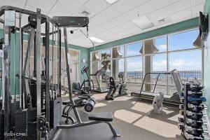 6415 Thomas Dr Unit 205, Panama City Beach, FL 32408 - gym featuring a water view