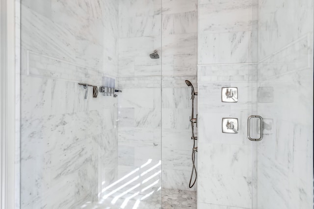 bathroom with an enclosed shower