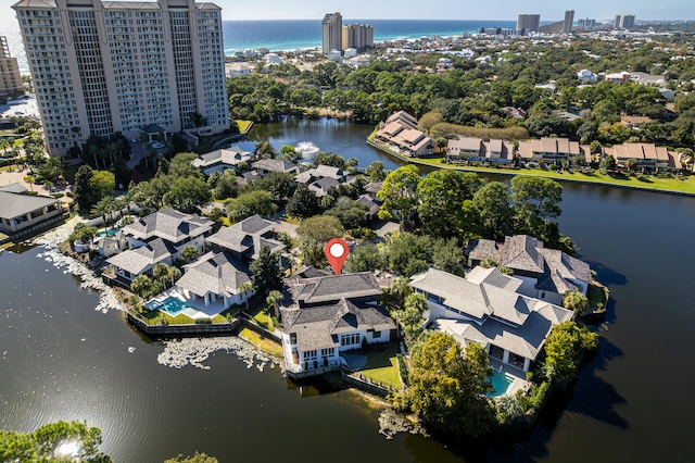 drone / aerial view with a water view