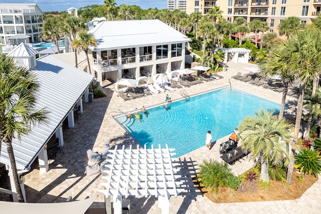 view of pool featuring a patio