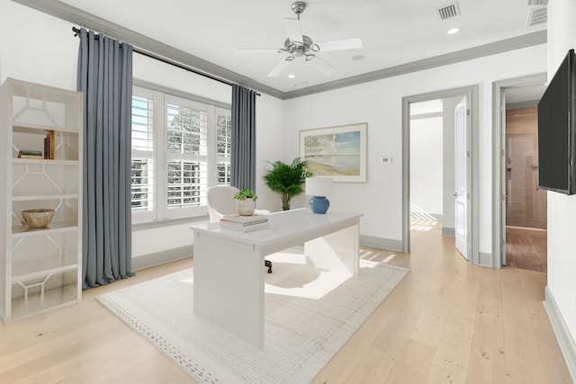 office area featuring ornamental molding, light hardwood / wood-style floors, and ceiling fan