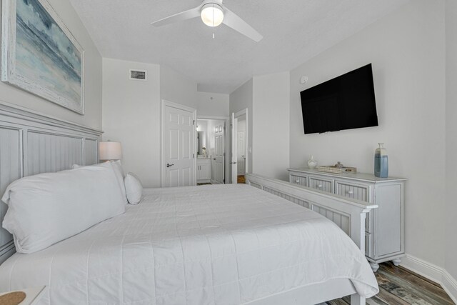 bedroom with ceiling fan and hardwood / wood-style flooring