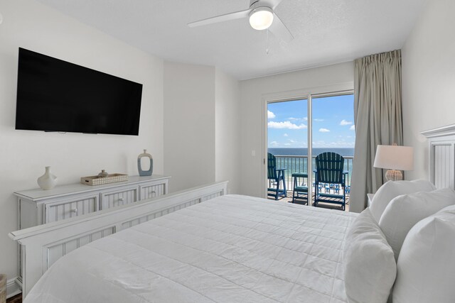 bedroom featuring ceiling fan and access to exterior