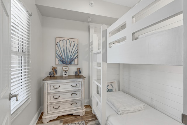 1111 Santa Rosa Blvd Unit 604, Fort Walton Beach, FL 32548 - bedroom featuring baseboards and wood finished floors