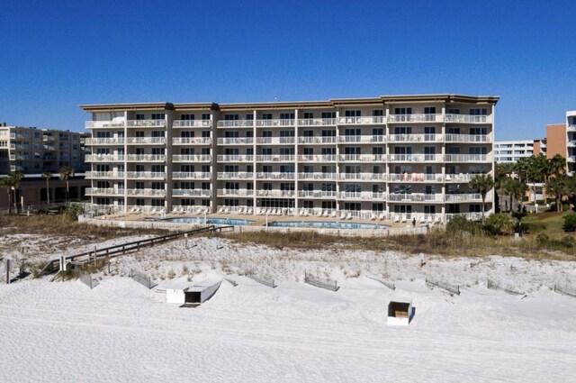 view of snow covered property