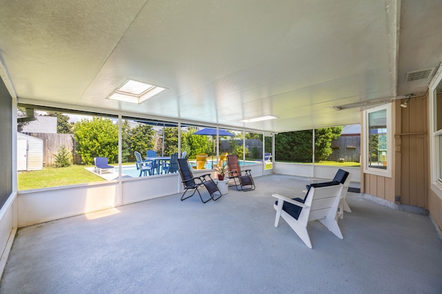 sunroom / solarium with a skylight