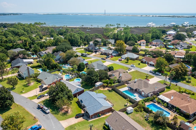 drone / aerial view with a water view