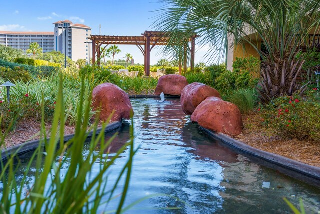 view of property's community with a pergola